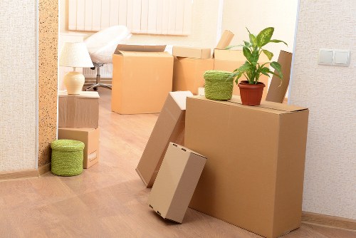 Expert packers handling fragile household items during a Bayswater relocation